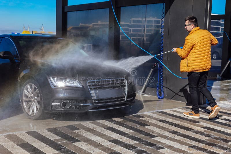 Car Washing Car in a Selfservice Car Wash Station. Car Wash Self
