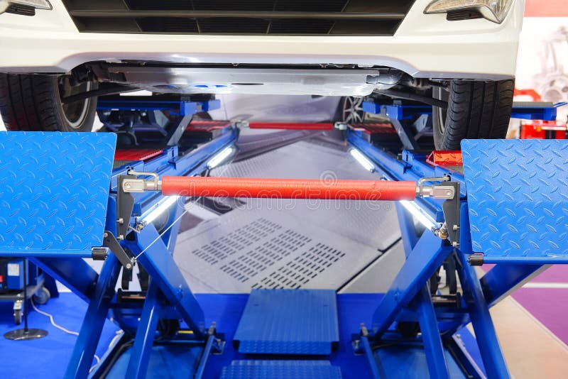 Car on a Wheel Alignment Lift Stock Photo Image of disc, control