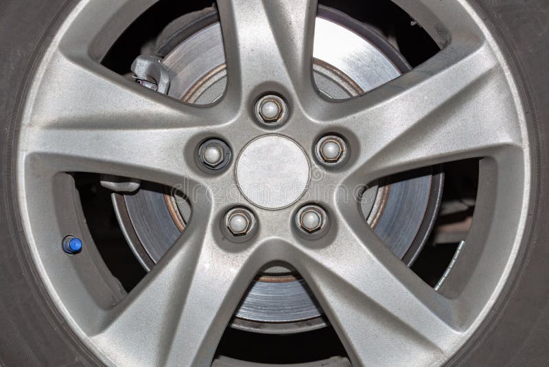 Car Wheel on a Car Closeup, Wheel Tuning Disk and Tire Stock Image
