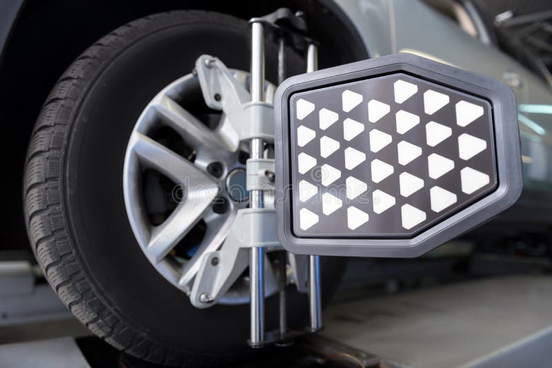 Car Wheel Fixed in Alignment Machine Clap Stock Photo Image of inside