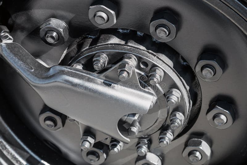 Car Wheel Nuts with a Big Truck Stock Photo Image of technology, auto