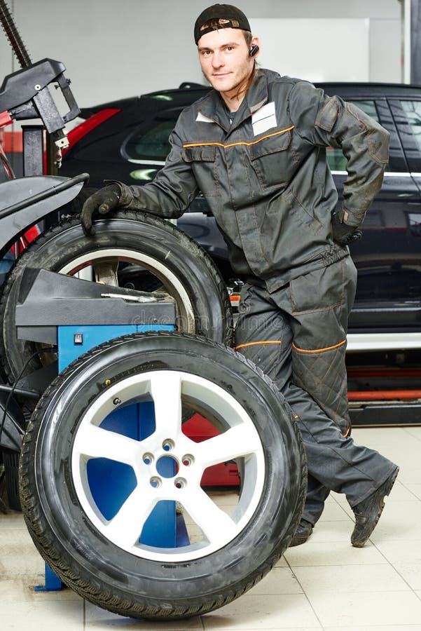 Car Wheel Tyre Fitting or Replacement Stock Image Image of technician