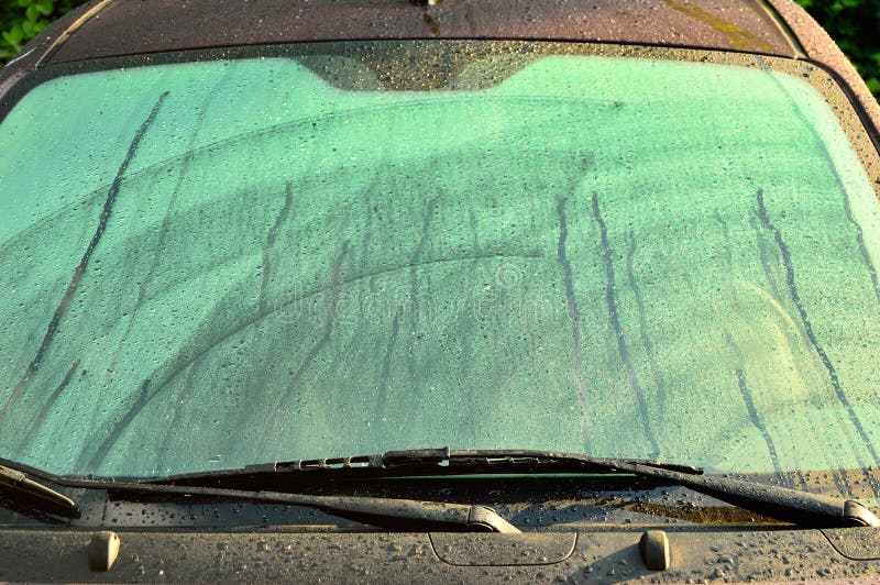 Car Windshield with Raindrops or Fog. Autumn. Day Stock Photo Image