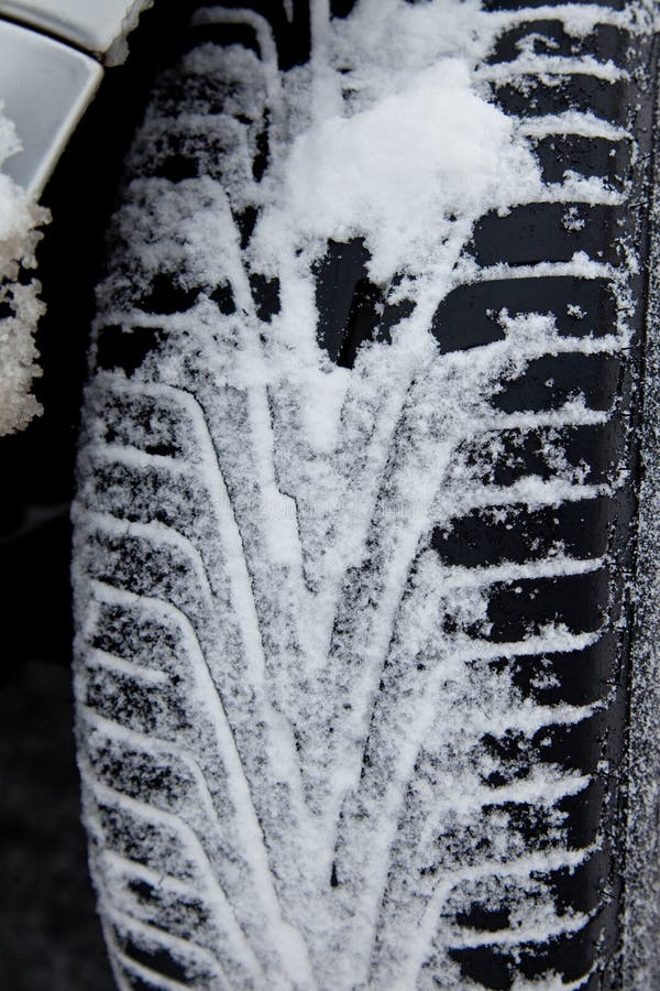 Winter Tires in the Snow stock photo. Image of snow, tires 13565764