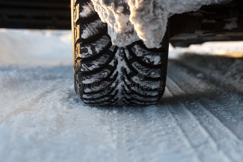 Car Winter Tires on a Snowy Road Stock Photo Image of tyre, closeup