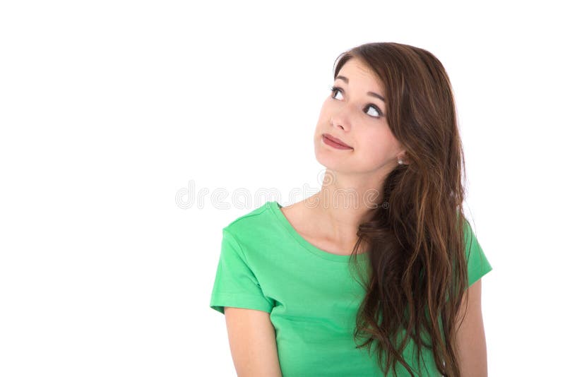 Cara de una muchacha morena bonita aislada en el blanco que mira para arriba. imagenes de archivo