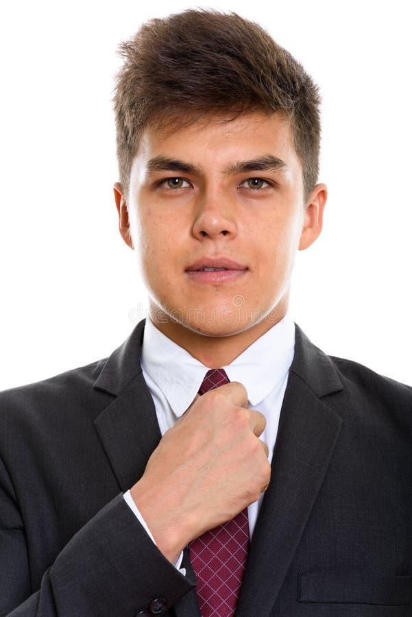 Cara del lazo hermoso joven de la fijación del hombre de negocios fotos de archivo Cara del lazo hermoso joven de la fijación del hombre de negocios fotos de archivo