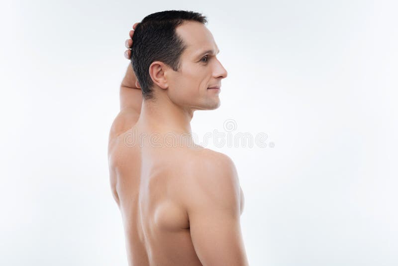 Cara ereta do homem considerável agradável meia imagem de stock royalty free Cara ereta do homem considerável agradável meia imagem de stock royalty free