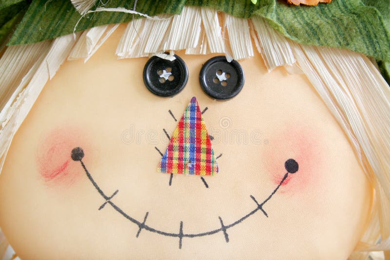 Close up of a scarecrow with a smile on his face. Close up of a scarecrow with a smile on his face.