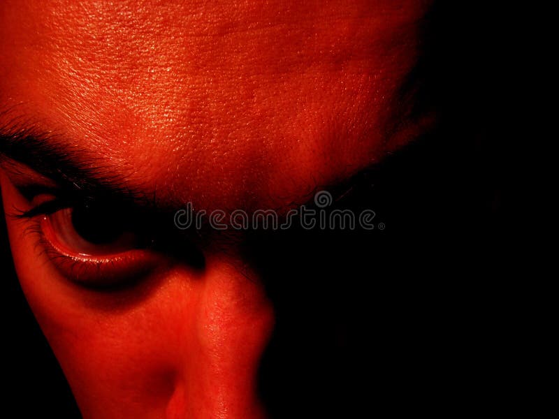 Close up of male face ... red devil. Close up of male face ... red devil