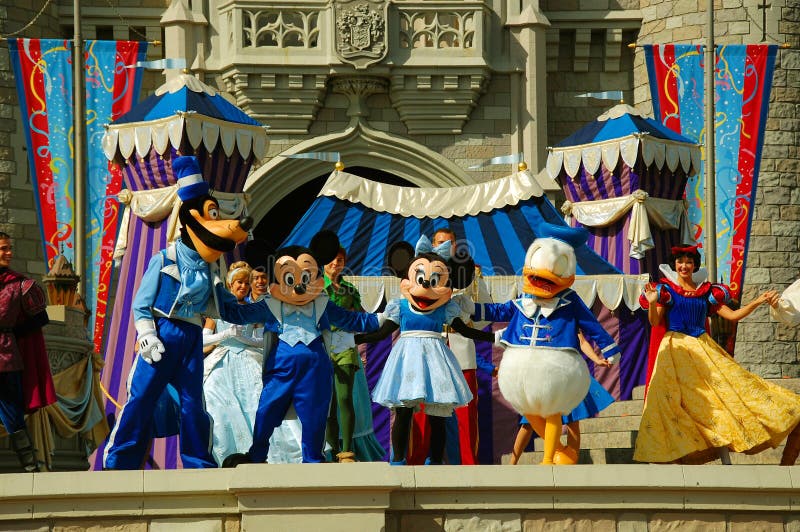 The leading characters of Disney Mickey, Minnie, Goofy and Donald are on stage during the Dreams Come True magical show in Magic Kingdom, Orlando. The leading characters of Disney Mickey, Minnie, Goofy and Donald are on stage during the Dreams Come True magical show in Magic Kingdom, Orlando.