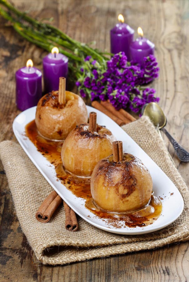 Caramel apples on wooden table