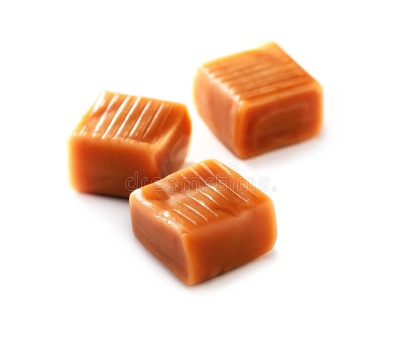 Caramel candy on white stock image. Image of heap, confectionery 27935261