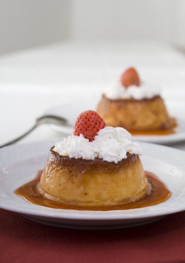 Caramel Custard Pudding with Mint. Homemade Caramel Dessert or Flan Isolated on a White