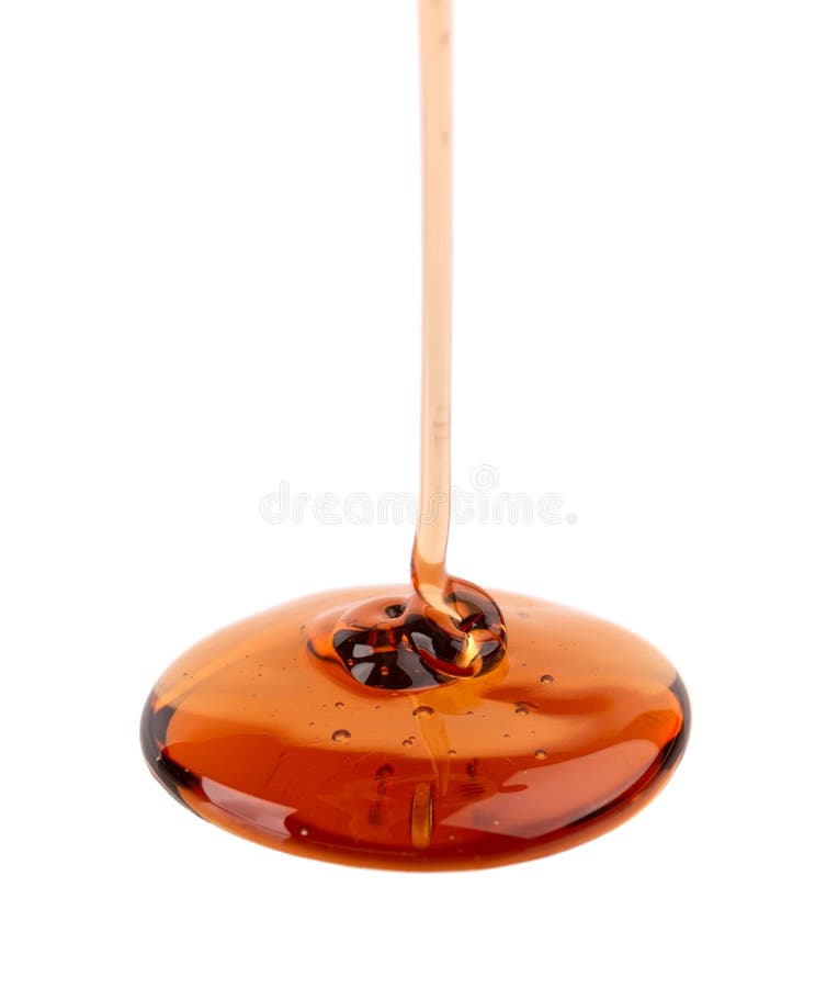 Caramel Syrup Drizzle Isolated on White Background. Splashes of Sweet Caramel Sauce. Top View