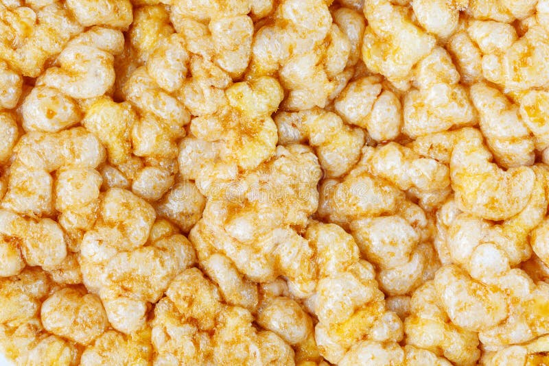 Caramelized Corn Cakes. Puffed Whole Grain Crispbread Isolated on White