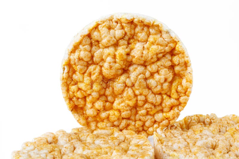 Caramelized Corn Cakes. Puffed Whole Grain Crispbread Isolated on White