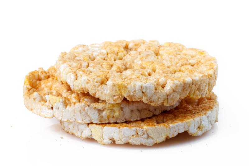 Caramelized Corn Cakes. Puffed Whole Grain Crispbread Isolated on White