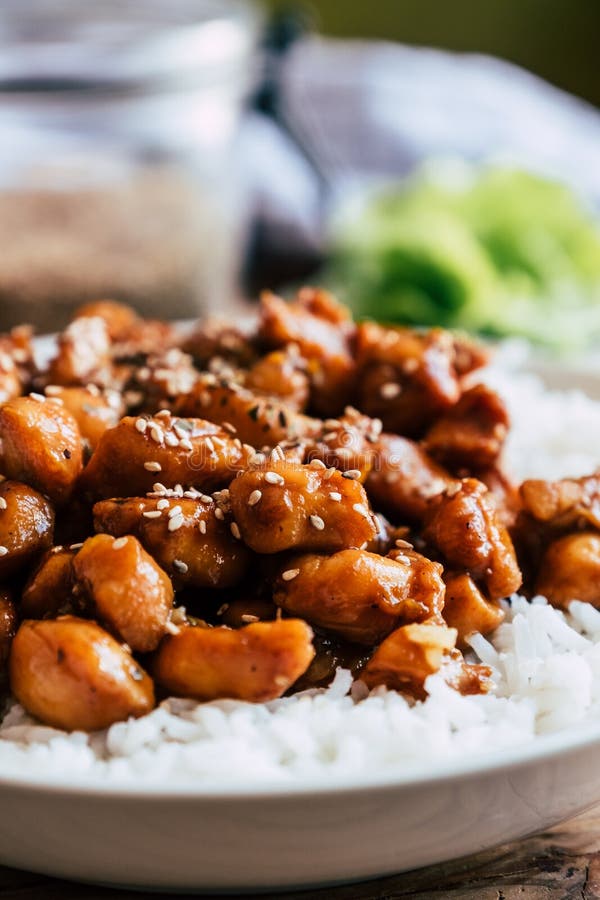 Caramelized Teriyaki Chicken with Sesame Seeds in a Bowl Stock Image