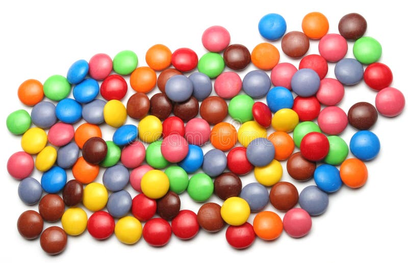 Scattered colourful candy on a white background. Scattered colourful candy on a white background.