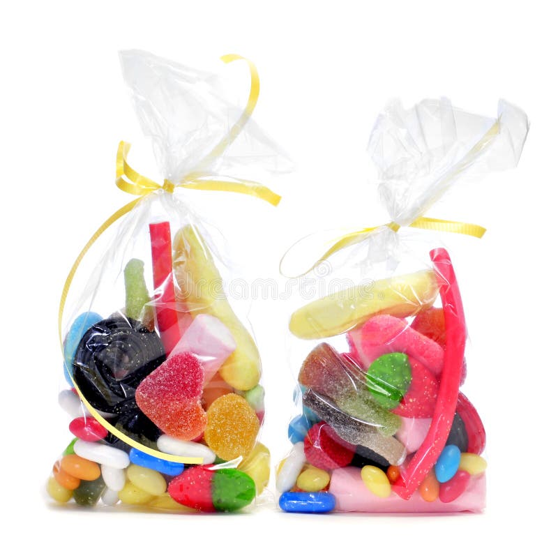 Some plastic bags with candies on a white background. Some plastic bags with candies on a white background