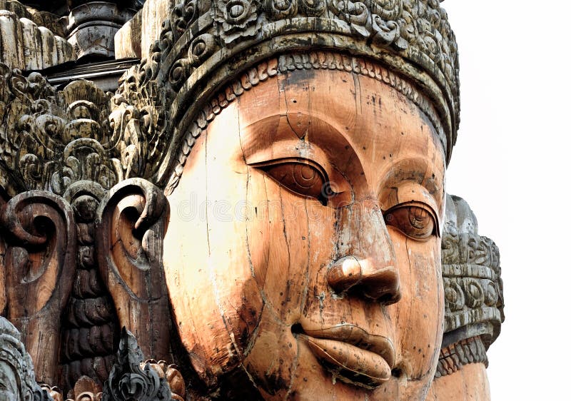 Caras talladas de Buddha en Tailandia fotografía de archivo Caras talladas de Buddha en Tailandia fotografía de archivo