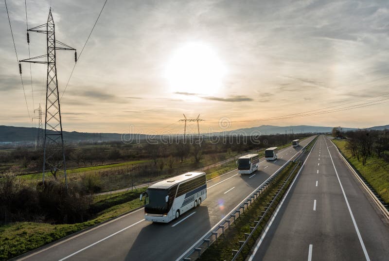 Caravan or convoy of busses on highway