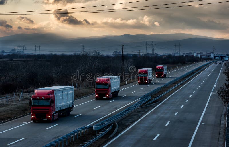 Caravan or convoy of lorry trucks on country highway royalty free stock photos Caravan or convoy of lorry trucks on country highway royalty free stock photos