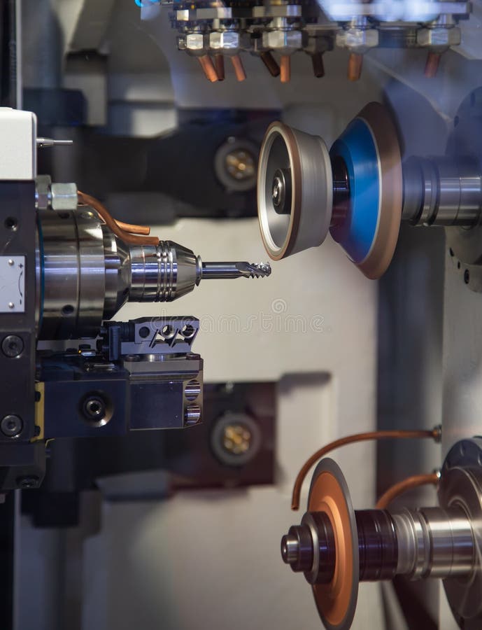 Carbide grinding machine stock photo. Image of operating 166009476