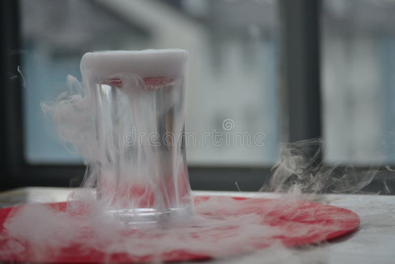 Carbon Dioxide is Heavier Than Air Visible on the Glass Stock Image