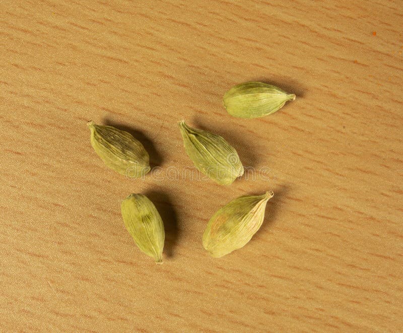 Cardamom Seeds stock photo. Image of wood, food, yellow 271222412