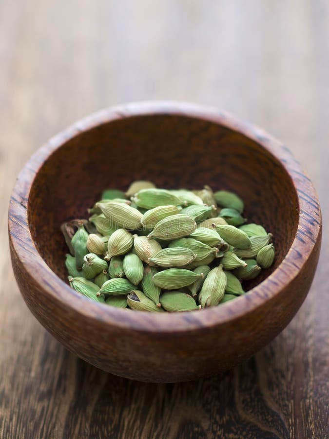 Cardamon pods stock photo. Image of flavor, indian, vertical 24438356