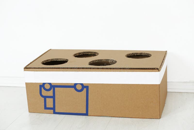 Cardboard box with holes