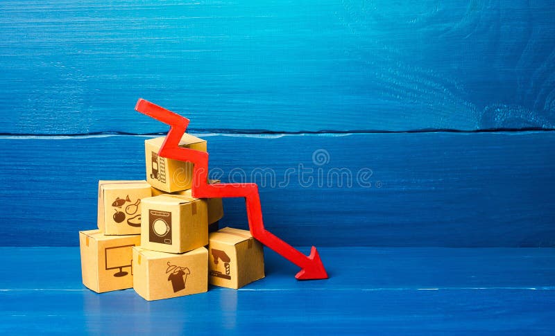 Cardboard boxes and red down arrow. Decline in sales and production volumes. Depressed economy. Low business activity
