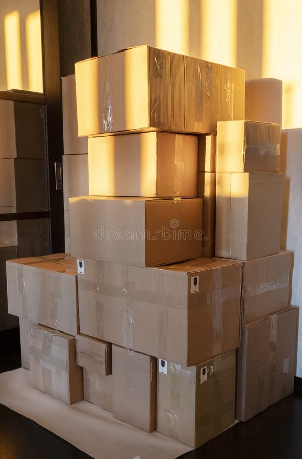 Cardboard boxes in the sun stock image. Image of boxes 225212875
