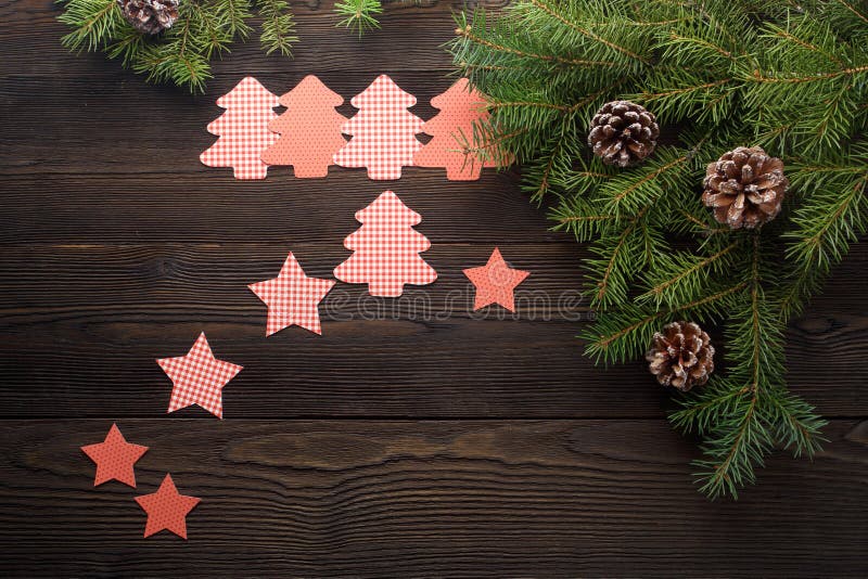 Christmas Composition on Wooden Background with Tree, Pine Cones and ...