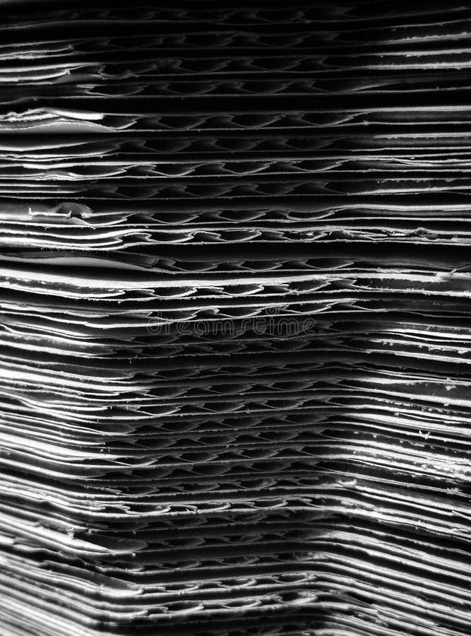 Cardboard stack in close-up stock images