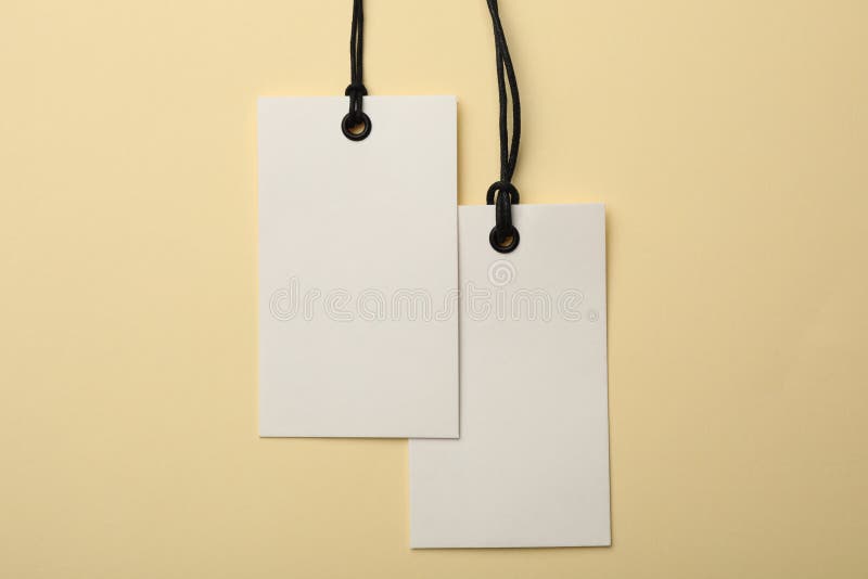 Cardboard tags with space for text, flat lay