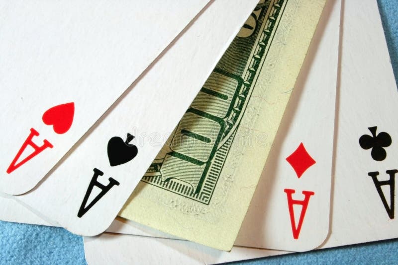 One hundred dollar paper with playing cards