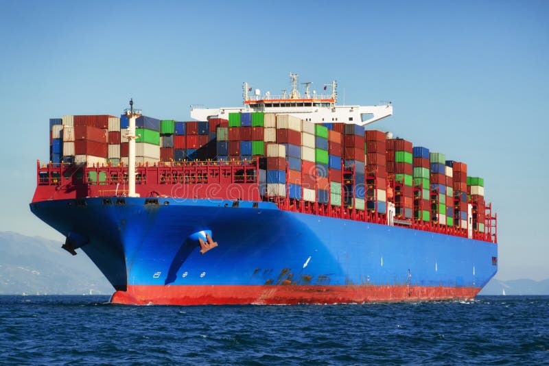 Cargo container ship in import export business, commercial international trade logistic and transportation concept.