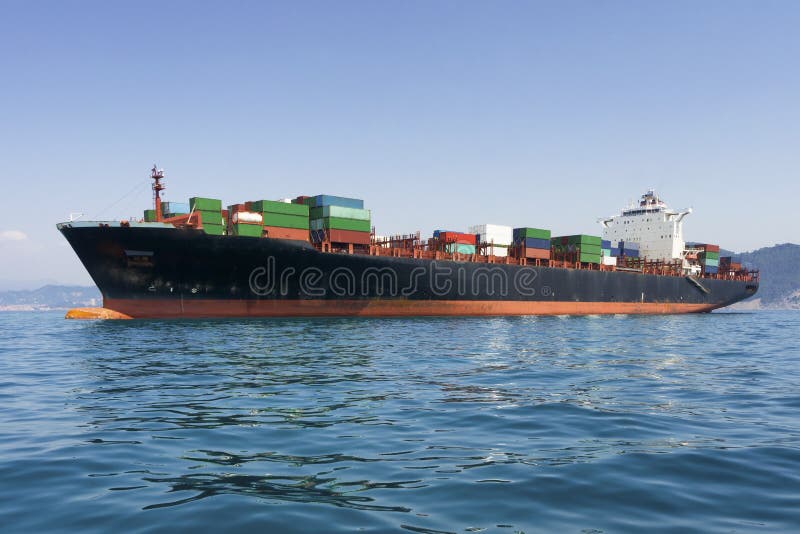Cargo freight, container ship in sea royalty free stock photo Cargo freight, container ship in sea royalty free stock photo