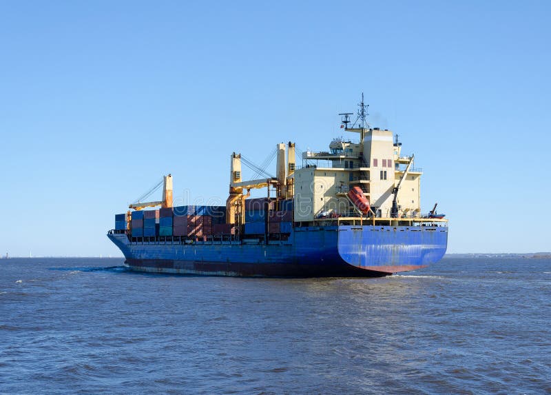 Cargo Ship Sailing in Still Water Stock Image Image of pacific, ocean