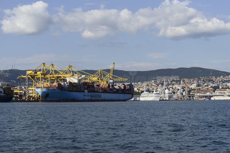 Cargo ships docked at Pier VII of the Port of Trieste loading:unloading containers royalty free stock photos