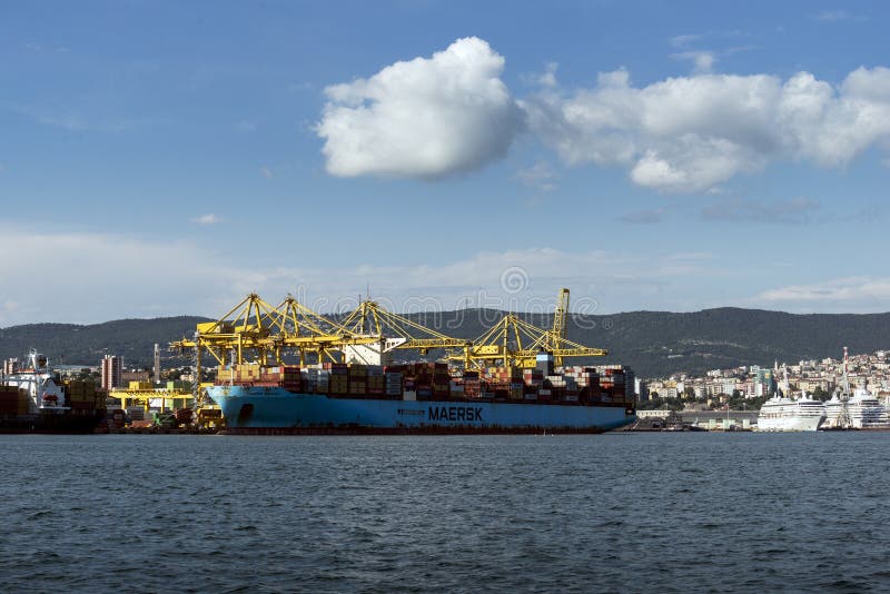 Cargo ships docked at Pier VII of the Port of Trieste loading:unloading containers royalty free stock photos