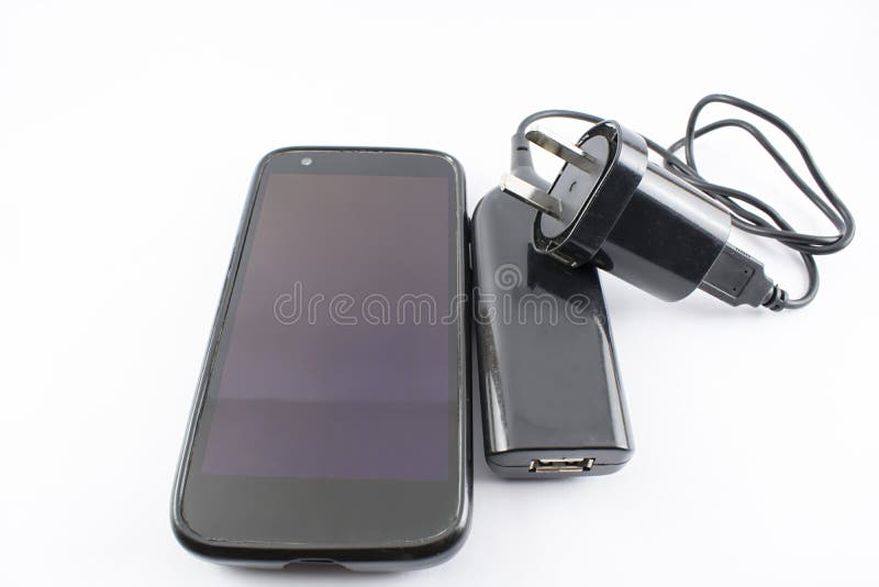 Caricatore del portatile e del cellulare immagine stock libera da diritti Caricatore del portatile e del cellulare immagine stock libera da diritti