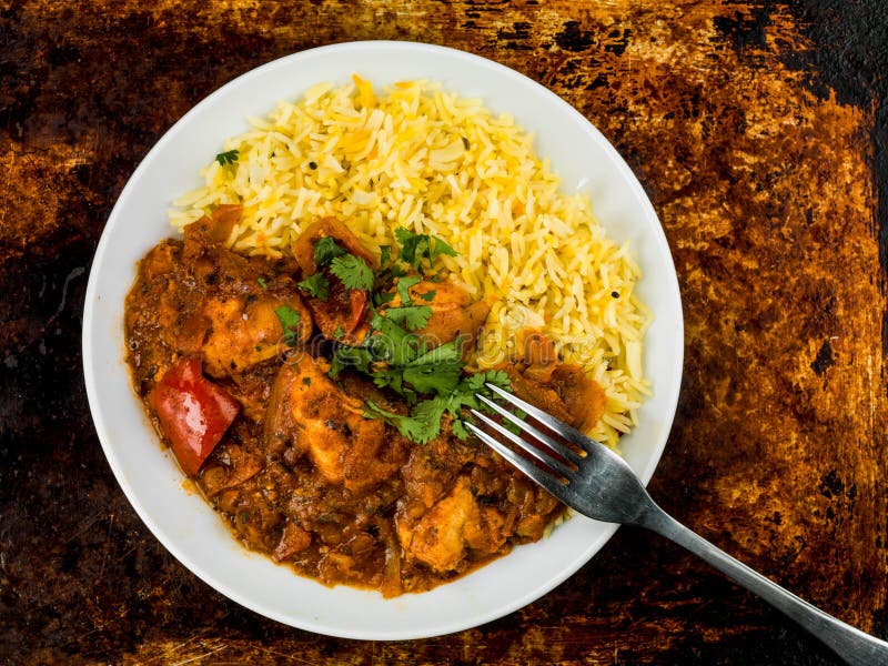 Caril de Jalfrezi da galinha com arroz temperado Basmati imagem de stock Caril de Jalfrezi da galinha com arroz temperado Basmati imagem de stock