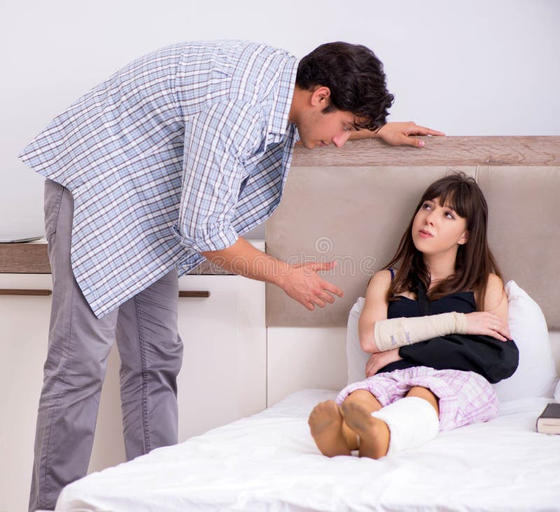 Caring Husband Looking After His Injured Wife Stock Image Image Of