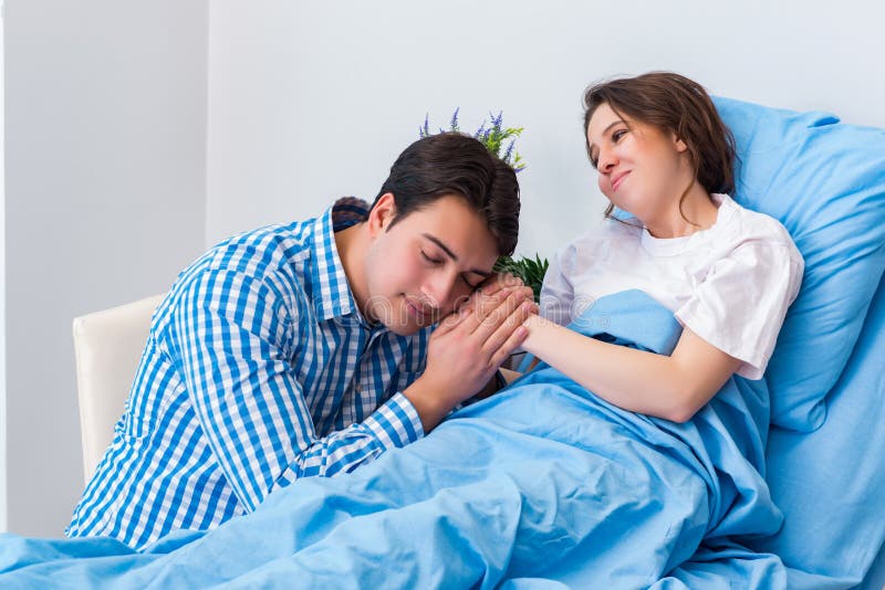 Husband And Pregnant Wife At Doctor Stock Image Image Of