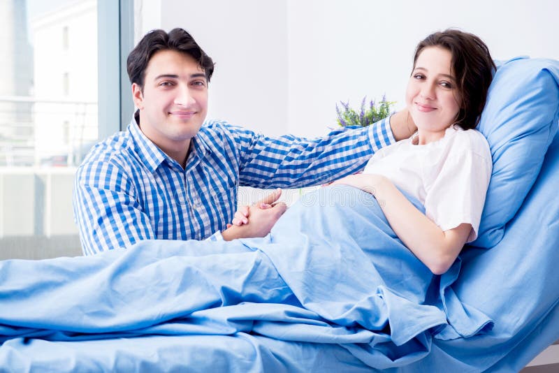 The Caring Loving Husband Visiting Pregnant Wife in Hospital Stock ...