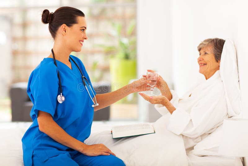 Caring young caregiver stock photos Caring young caregiver stock photos